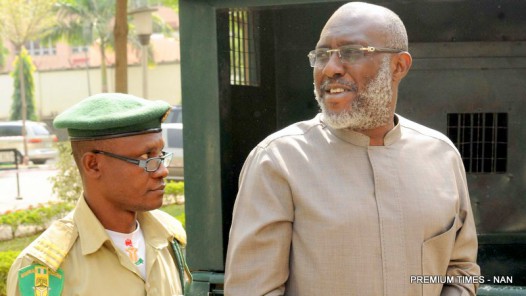 The National Publicity Secretary of PDP, Mr Oilsa Metuh, at the Federal
High Court, where he is standing trial over alleged N400m fraud, in Abuja