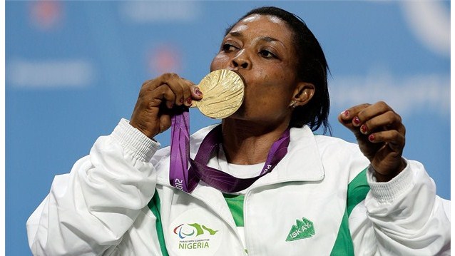 Esther Onyema kisses her medal