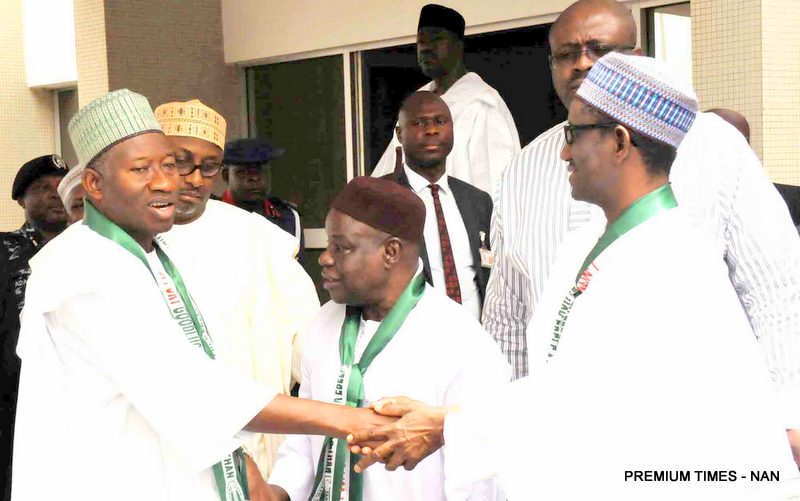 FILE PHOTO: President Goodluck Jonathan in a handshake with the PDP Governorship candidate Mallam Nuhu RIbadu at the PDP Stakeholders meeting