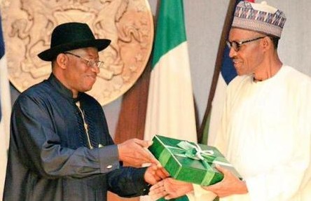 President Muhammadu Buhari receiving handover notes from former president, Goodluck Jonathan