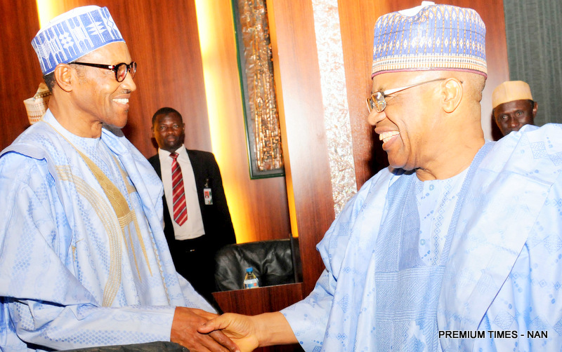 FILE:  PRESIDENT MUHAMMADU BUHARI (L), IN A HANDSHAKE WITH  FORMER MILITARY PRESIDENT IBRAHIM BABANGIDA, AT THE MAIDEN NATIONAL COUNCIL OF STATES MEETING, AT THE PRESIDENTIAL VILLA IN ABUJA ON WEDNESDAY (21/10/15). 
3752/21/10/2015/ICE/BJO/NAN