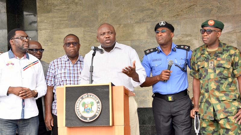 FILE PHOTO: Lagos State Governor, Mr. Akinwunmi Ambode (middle), addressing the media on the rescue of three female students of Babington Macaulay Junior Seminary, Ikorodu at the Lagos House, Ikeja, on Sunday, March 06, 2016. (R-L) With him are Commanding Officer, 9 Mechanized Brigade, Brigadier General Bulama Biu; Commissioner of Police, Mr. Fatai Owoseni; Attorney General & Commissioner for Justice, Mr. Adeniji Kazeem and Commissioner for Information & Strategy, Mr. Steve Ayorinde.