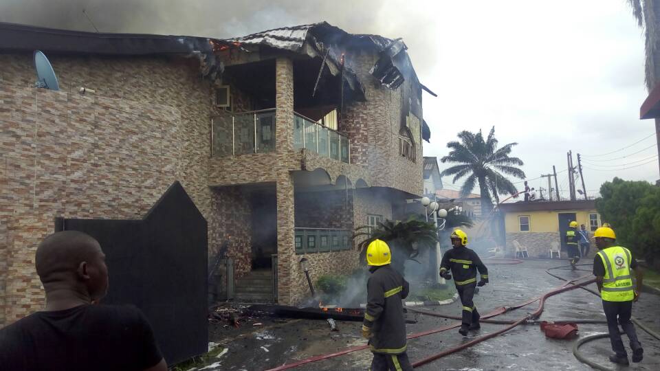 Fire fighters on ground at the scene