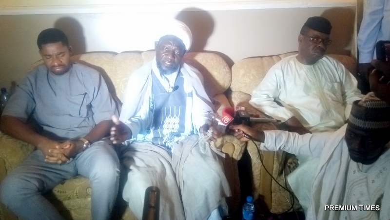 Yakubu Yahaya, leader of the Katsina chapter of the Shiite sect, flanked by Oyetakin Ebenezer Executive Secertary Anticorruption Network (R) and Deji Adeyanju Concern Nigeria (L) addressing a press conference after a mob attacked Shiites in Kaduna on Friday.