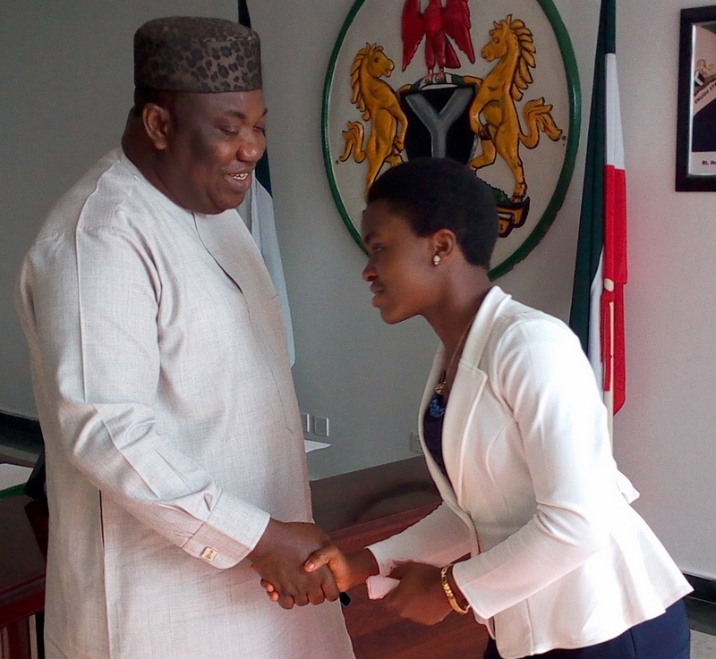 Enugu WAEC  StudentGovernor Ifeanyi Ugwuanyi of Enugu State congratulating Miss Cynthia Ali, a student who had A1 in all her nine WAEC subjects, after the governor awarded her a first degree scholarship to any Nigerian university of her choice in Government House, Enugu, yesterday.