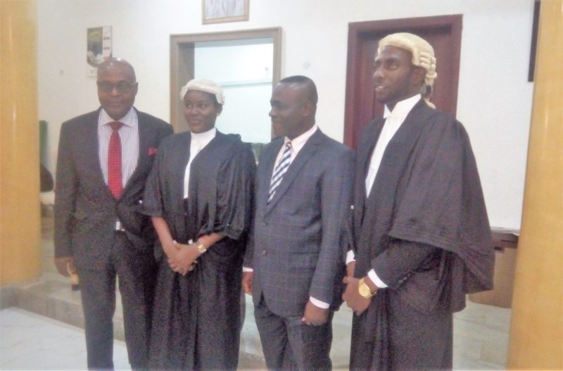 Senior Special Assistant to the President on National Assembly Matters, Ita Enang (2nd from Right) with the Dean, Faculty of Law, University of Uyo, Imo Udofa at the reception in honour of two law graduates of the University, Kuseme Iseh (2nd left) and Inyene John (right) in Abuja on Wednesday.