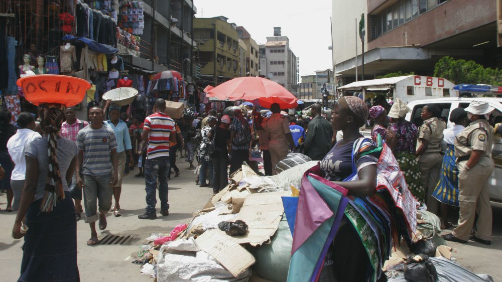 CORONAVIRUS: Nigerians on the street going about their daily business. [Photo credit: Quartz]