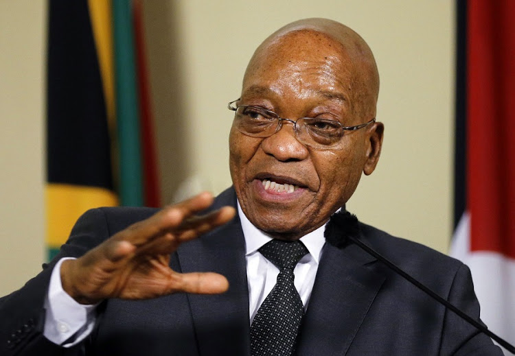 Former South Africa President Jacob Zuma gestures during a media briefing with Palestinian President Mahmoud Abbas (not pictured) at the Union Building in Pretoria November 26, 2014. REUTERS/Siphiwe Sibeko (SOUTH AFRICA - Tags: POLITICS)