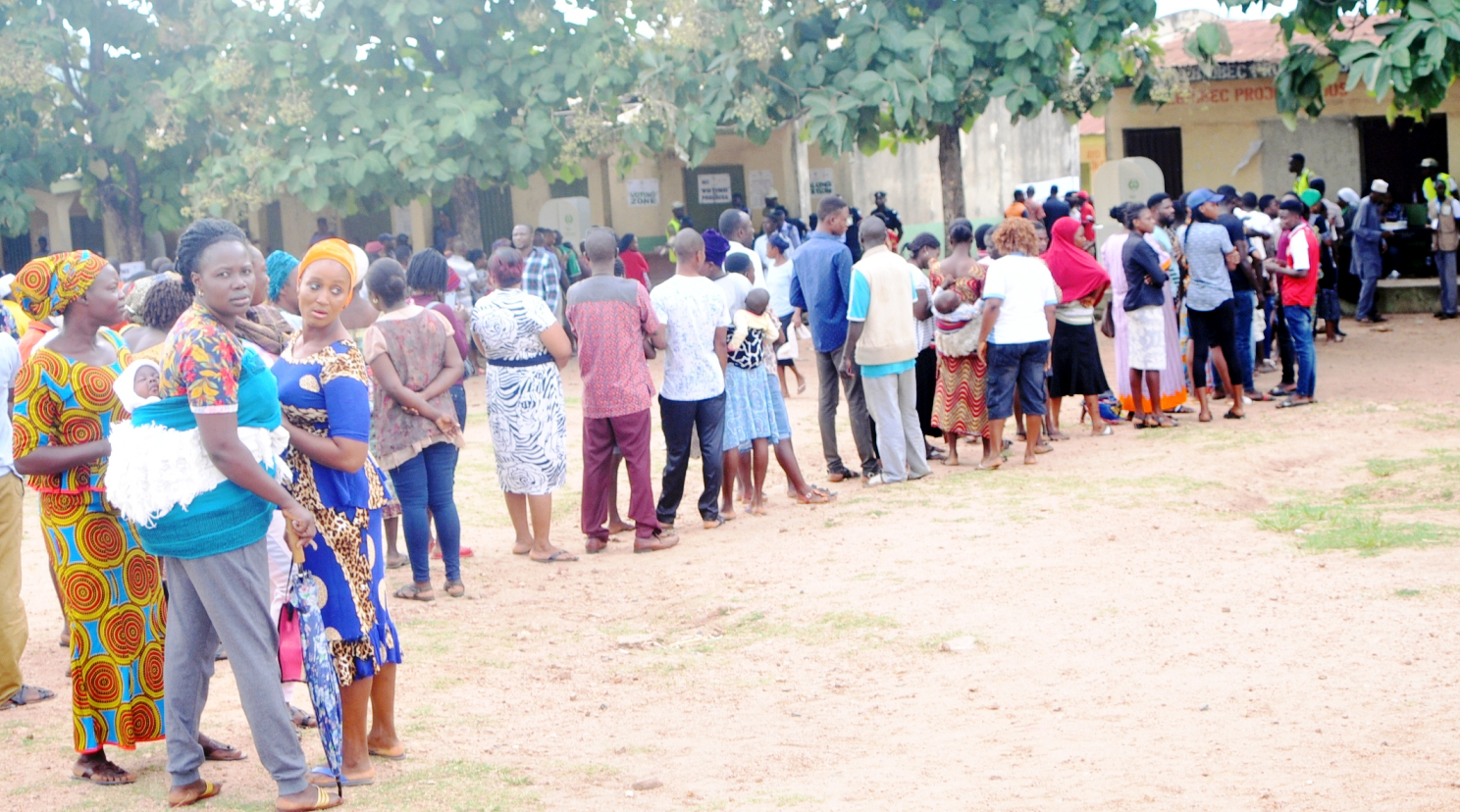 Voters queuing to cast their votes