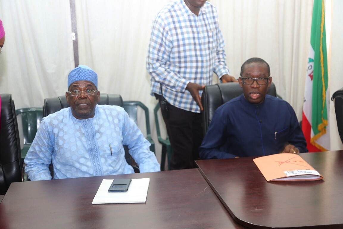 Pix 1. Delta State Governor, Senator Ifeanyi Okowa (right) and National Secretary of PDP, Senator Ibrahim Tsauri, shortly before going into a Closed door meeting with the 2018 PDP Special National Convention Committee Members, at Wadata Plaza, Abuja. PIX ; JIBUNOR SAMUEL.