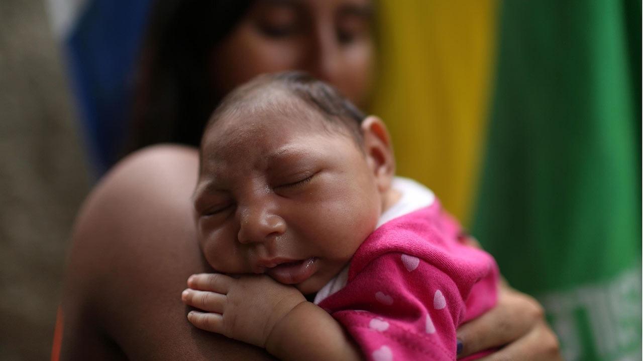This baby in Rio de Janeiro, Brazil, was born with microcephaly after her mother [photo: Science.com]