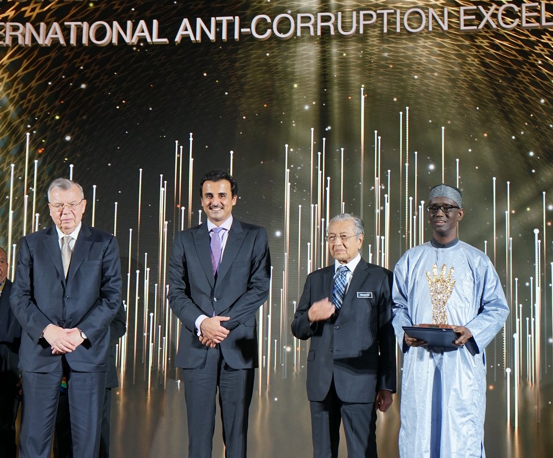 L-R: Executive Director, United Nations Office on Drugs and Crimes (UNODC), Mr Yury Fedoyov, Emir of Qatar, Sheikh Tamim Bin Hammad al Thani, Malaysian Prime Minister, Dr Mahathir Mohamad and EFCC Chairman of EFCC, Mallam Nuhu Ribadu, after Ribadu was conferred with lifetime/outstanding anticorruption award by the Rule of Law and Anticorruption Centre (ROLACC), in Malaysia, on Friday.