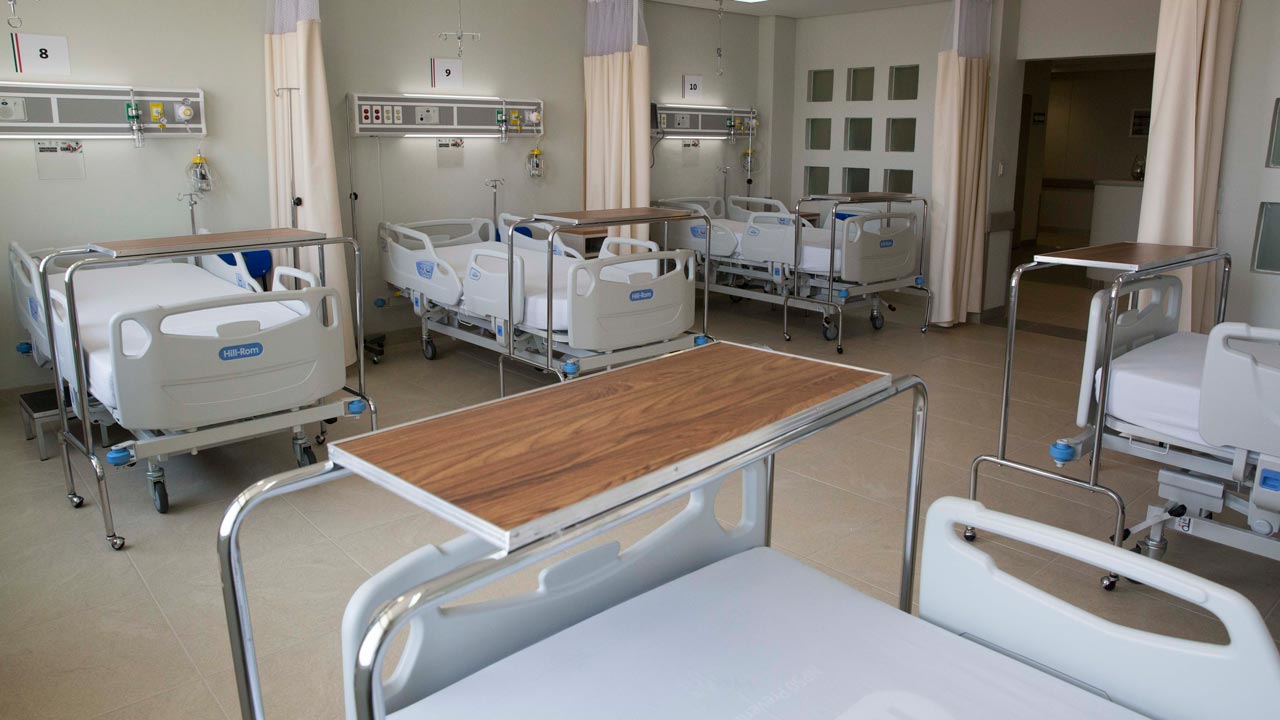 Hospital beds used to illustrate the story.