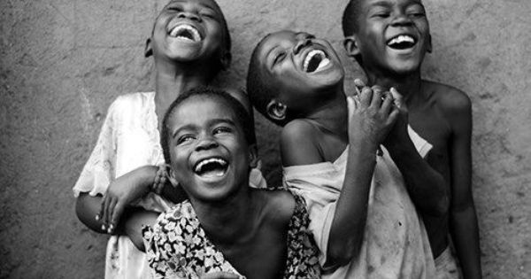 Photo of some happy Nigerians laughing used to illustrate story[PHOTO CREDIT: lists.ng]