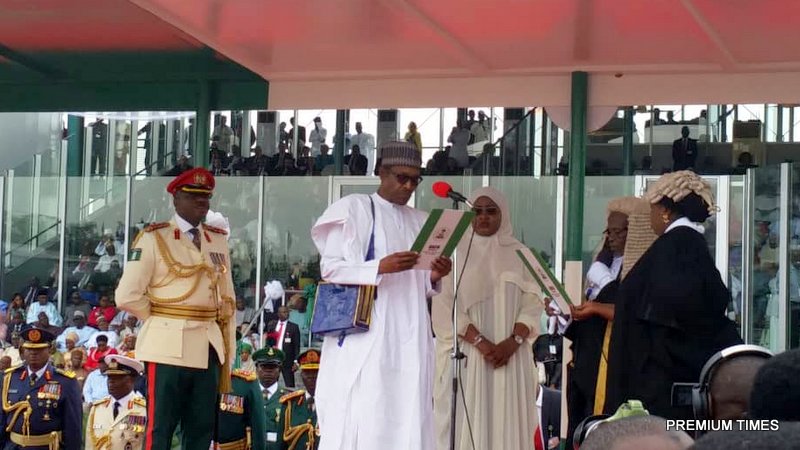 President Muhammadu Buhari and wife as he recites the oath of office for second tern.