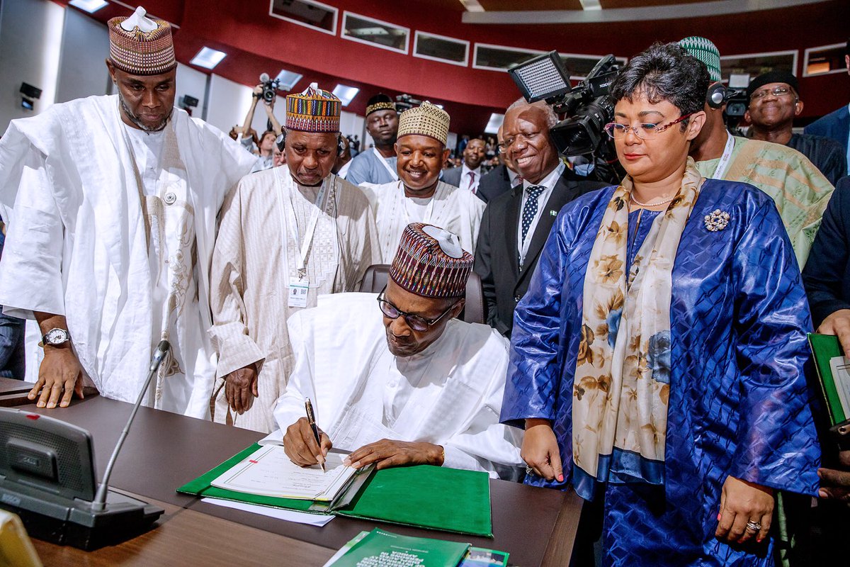 President Muhammadu Buhari signing the agreement establishing the African Continental Free Trade Area (AfCFTA), on behalf of Nigeria