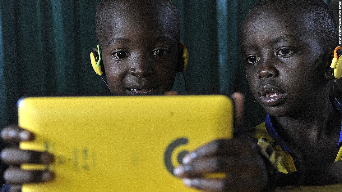 Children using a mobile device [Photo: CNN]