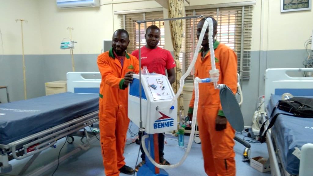Jerry Mallo (right) with team member displaying ventilator