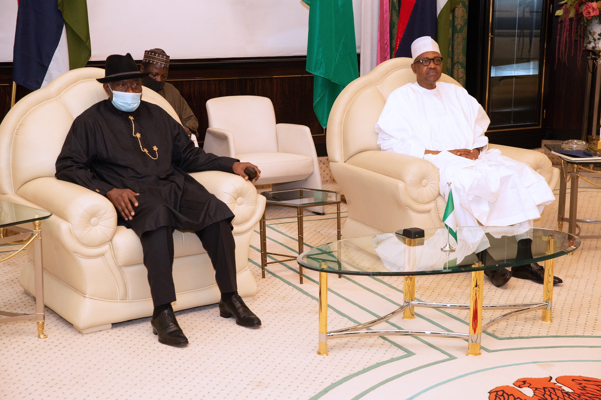 Former Nigerian President, Goodluck Ebele Jonathan, visits president Muhammadu Buhari at the state house. [PHOTO CREDIT: Official Twitter handle of Buhari || @MBuhari]