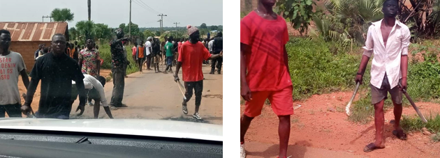 Weapon-wielding protesters after Yusuf Magaji's body was recovered. Source: Security. 