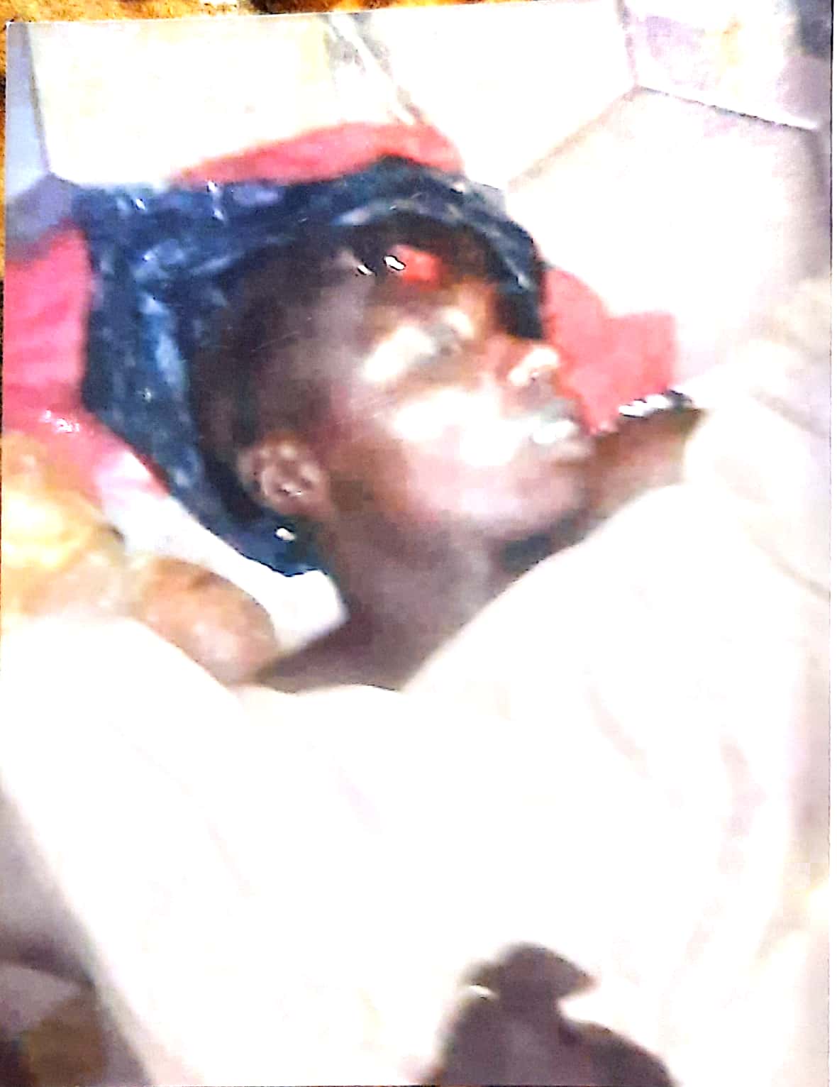 Sani Umar, with skull packed in a plastic bag
