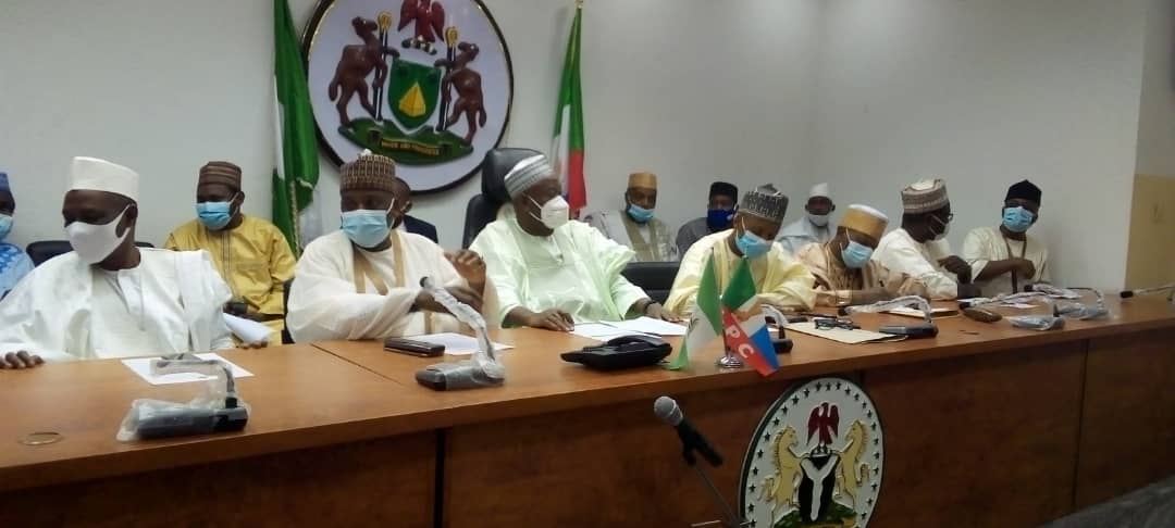 Governor Ganduje flanked by top governments' officials