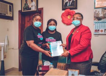 WARIF representatives presenting the policy document to the Lagos State Commissioner of Education, Folashade Adefisayo, on Thursday.