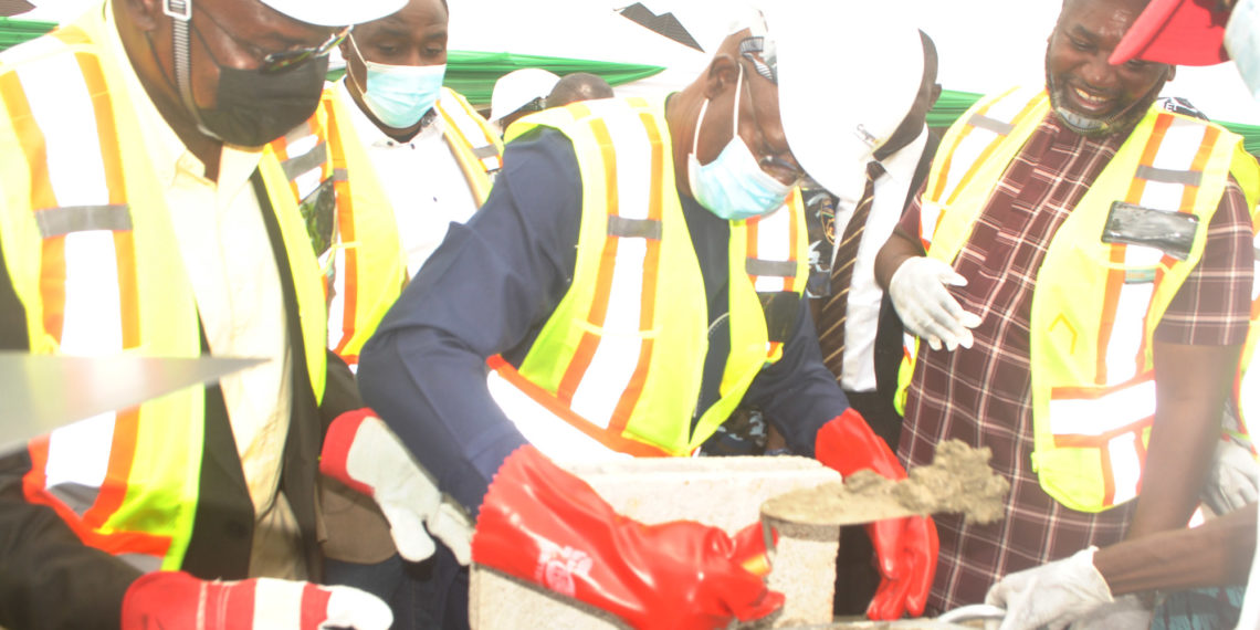 Deputy Governor of Benue State, Engr Benson Abounu (middle) laying the foundation stone of BIPC-Cosgrove Smart Estate while the Chief Technical Officer, Cosgrove, Engr Baba Kalli (Left) and a cheerful Managing Director, BIPC, Dr Alex Adum assist him, at the estate site, Mabushi, Abuja, recently.