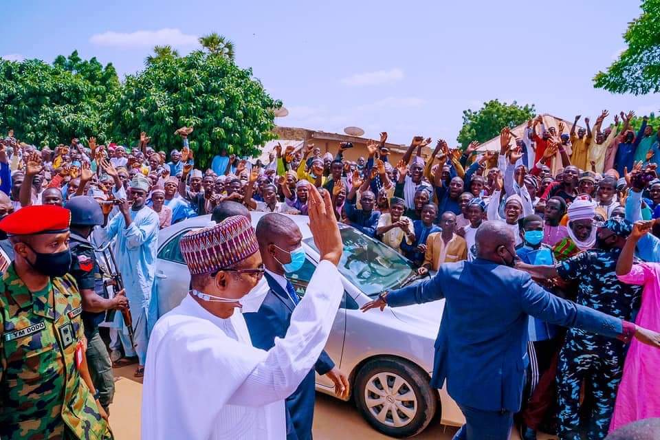 Buhari Waves at cheering crowd in Bichi Emirate Kano State