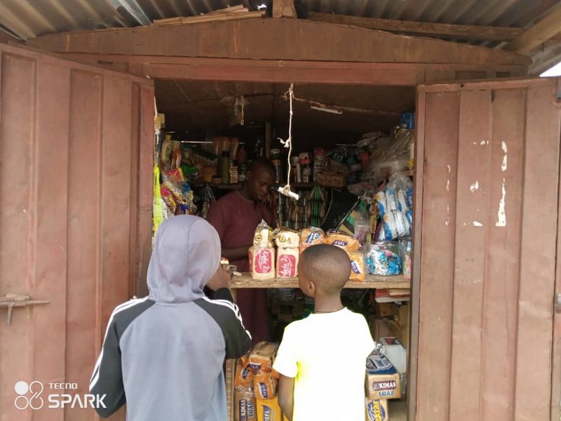 Bread seller in kubwa, Fct, Abuja (PHOTO CREDIT: Ntiedo Ekott)
