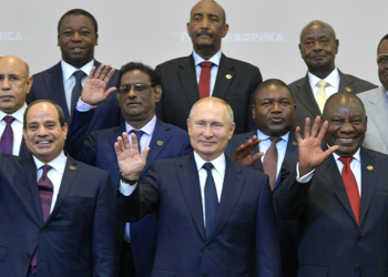 The heads of delegations attending the Russia-Africa Summit pose for photographs.