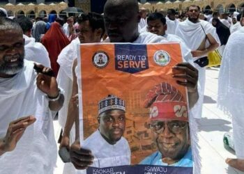 Nigerian politician displays Tinubu’s campaign poster in Ka’aba