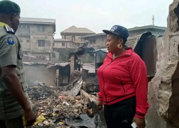 Chairperson of Afikpo North Local Government Area, Oby Enyim, at the scene of the fire incident