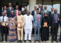 EFCC Chairman, Abdulrasheed Bawa, with the winners of the 2021 EFCC Essay Competition, members of the panel of judges, and management staff of EFCC