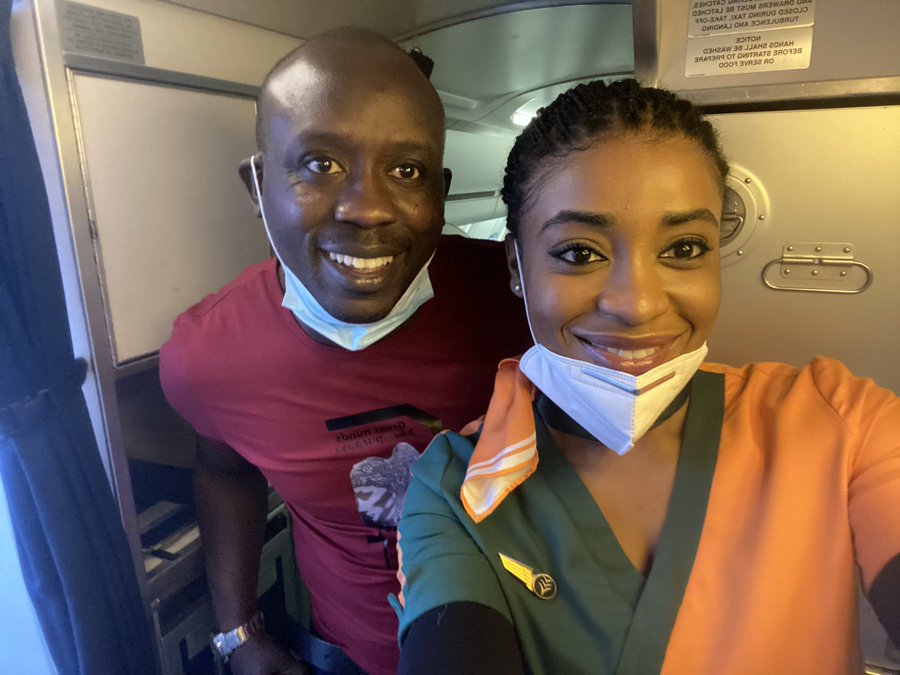 A passenger posed for photograph with Ibom Air flight attendant Photo credit _ Gbenga Wemimo
