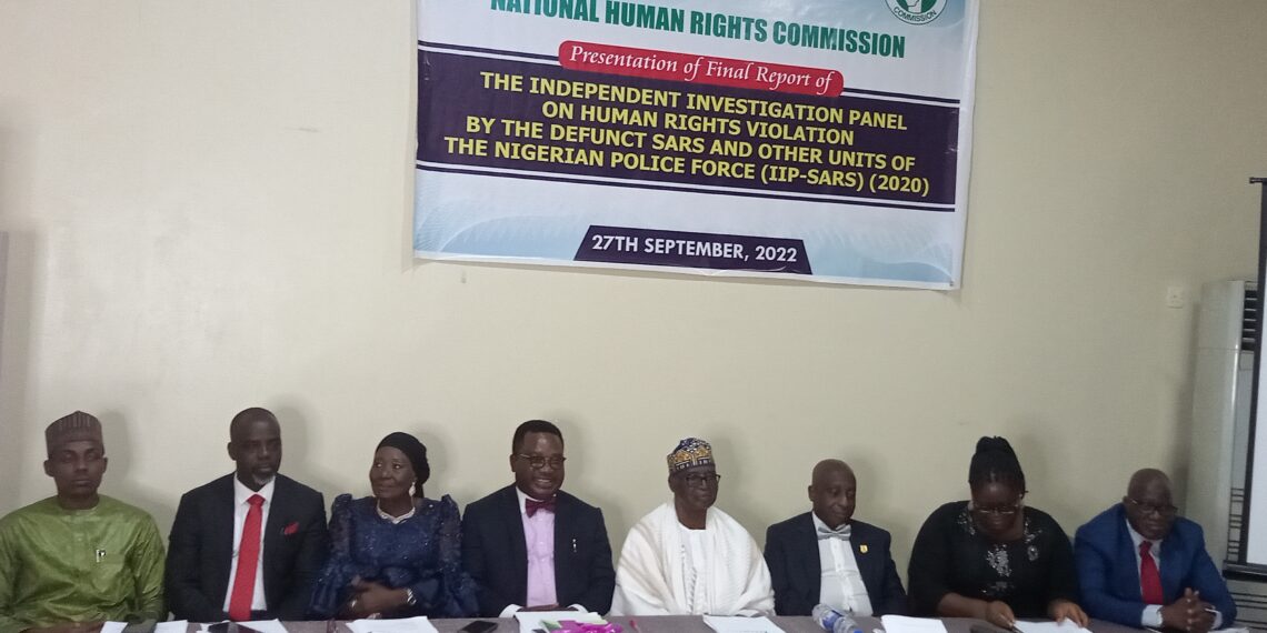 Executive Secretary of the National Human Rights Commission (NHRC), Tony Ojukwu (fourth from left), chairman of the independent investigative panel, Suleiman Galadima (fourth from right) and other members of the panel.