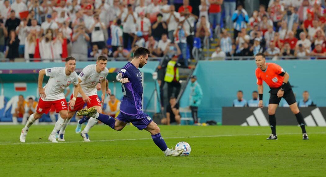 Argentina's forward Lionel Messi takes a penalty shot during the Qatar 2022 World Cup