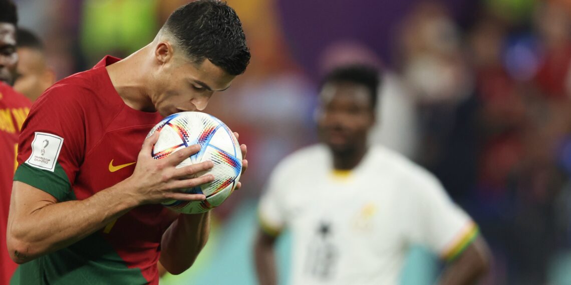 Christiano Ronaldo kisses the ball before taking a penalty kick which he scored against Ghana at the Qatar 2022 World Cup [PHOTO: @FIFAWorldCup]