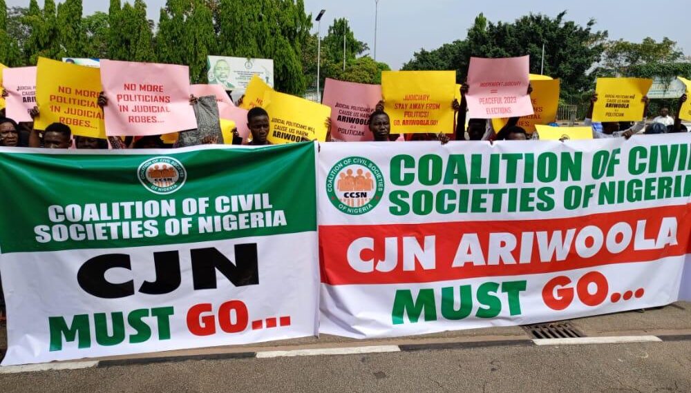 Protesters demanding the removal of the CJN