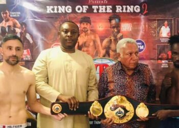 Fight promoter Prince Stanley Williams with Tasif Khan and Gabriel Laryea