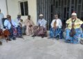 Calabar traditional rulers sit in front of their secretariat as protest over the locking up of the facility by local authorities