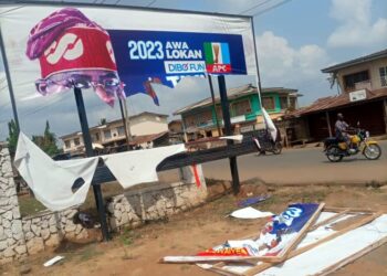 Damaged billboard of the presidential candidate of the APC, Bola Tinubu and his running mate, Kashim Shettima