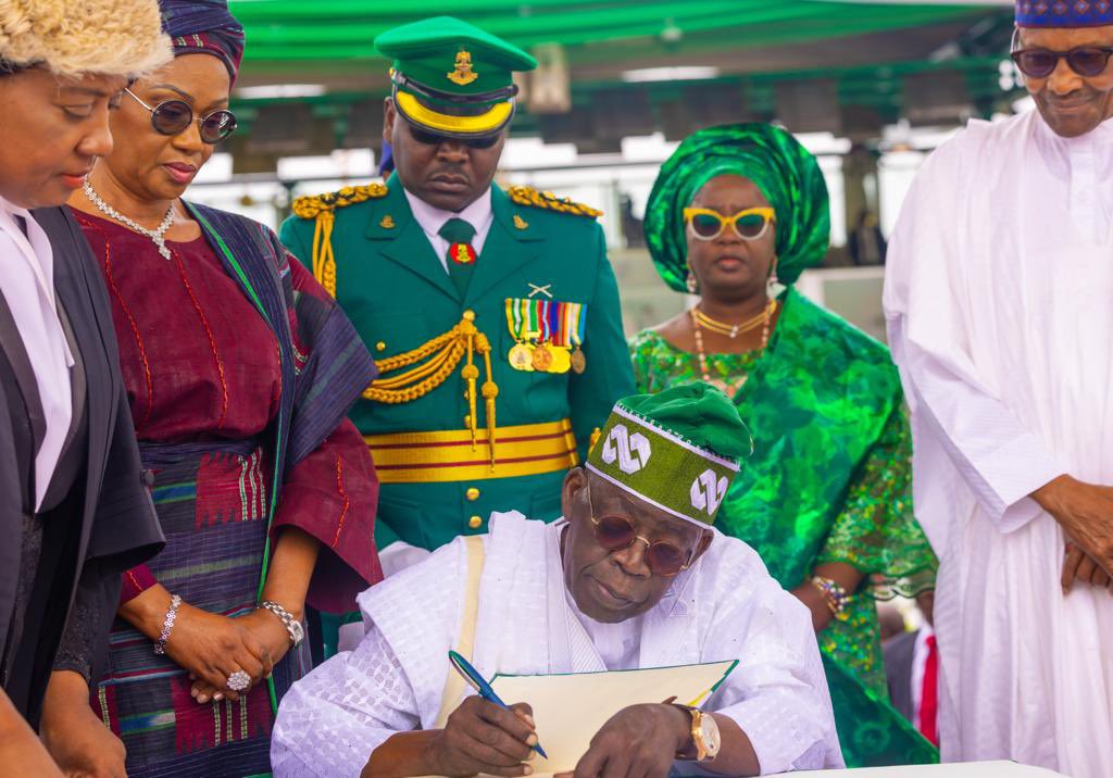 President of the Federal Republic of Nigeria and Commander-in-Chief of the Armed Forces Asiwaju Bora Ahmed Tinub GCFR signing the inauguration ceremony