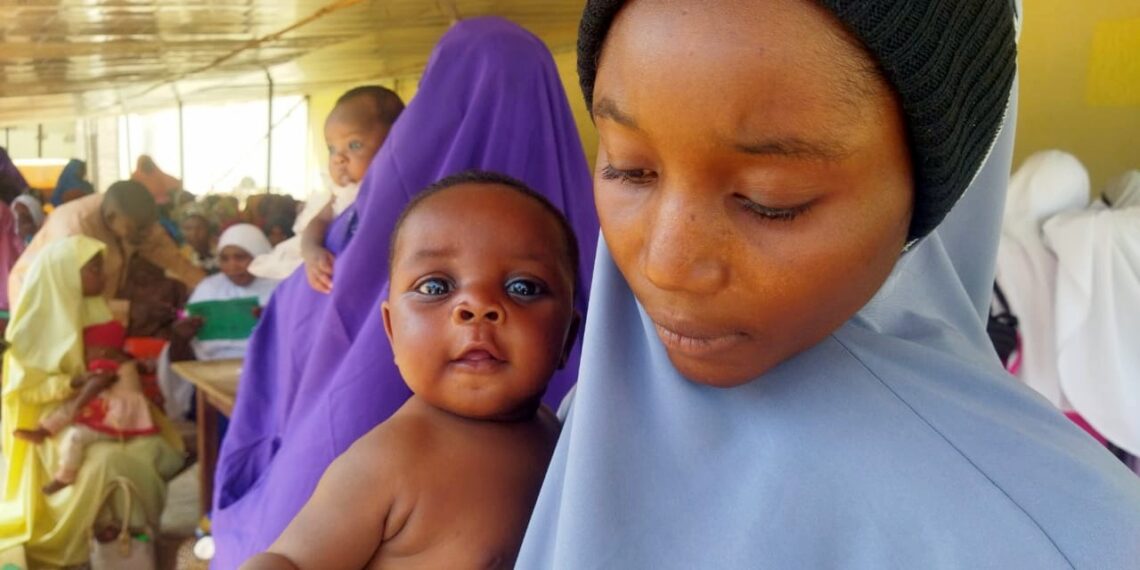 Mariya Aliyu and her newborn baby at the point of immunisation at the Hotoro PHC.