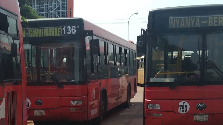 Mass transit buses parked along Kubwa expressway, Abuja [PHOTO: Premium Times - Emmanuel Agbo]