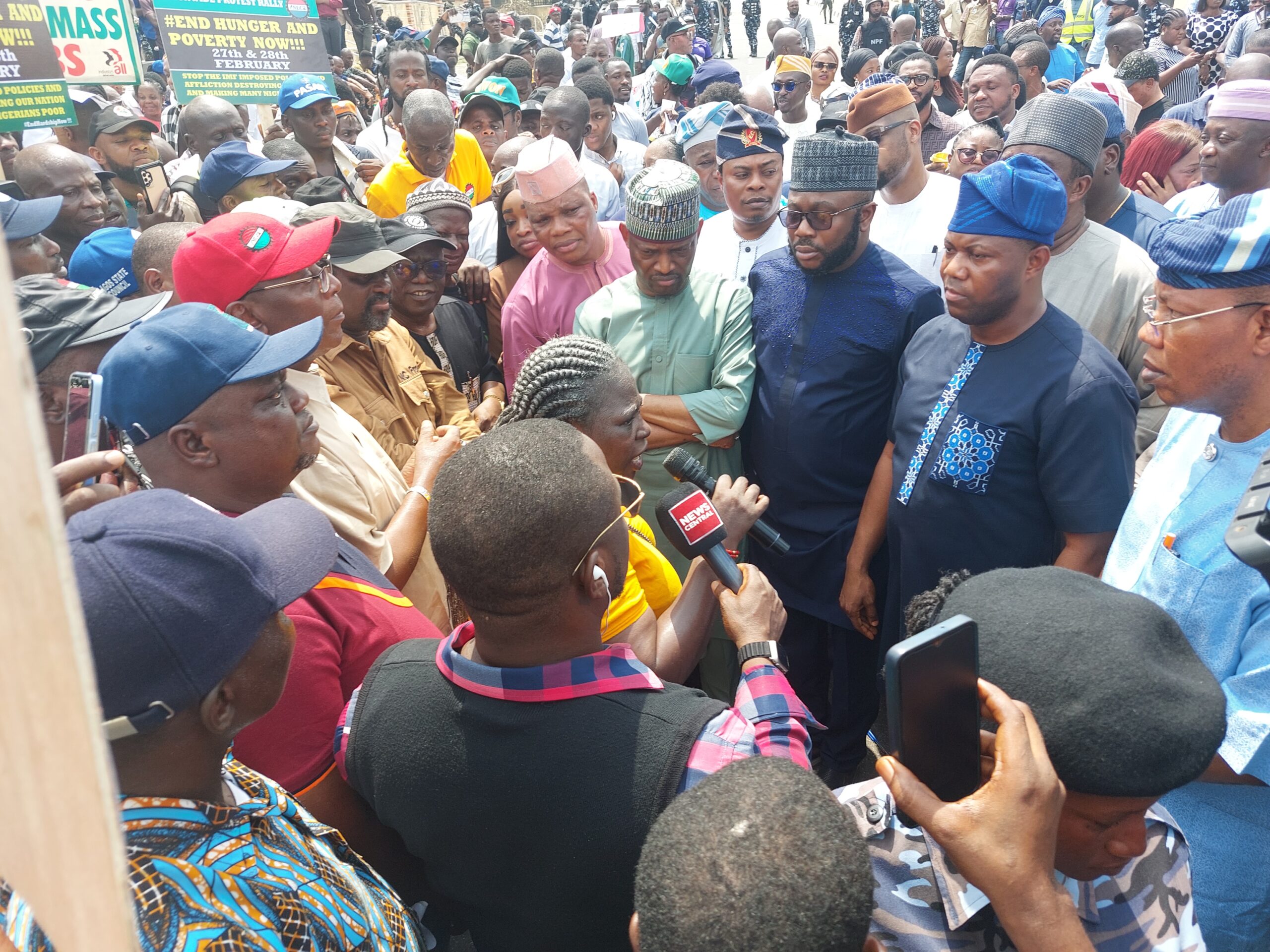 The majority leader of the Lagos House of Assembly, Noheem Adams, and other members receive the NLC protesters. (PHOTO CREDIT: Mariam Ileyemi)