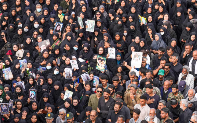 Iran holds mass funeral for 165 schoolgirls killed in US-Israel strike