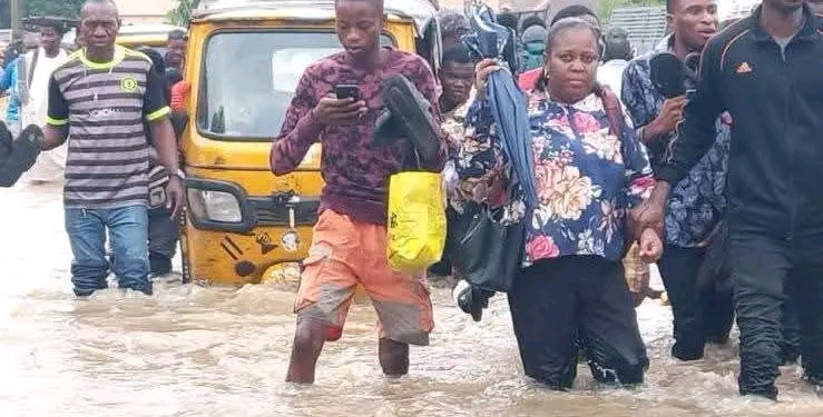 PHOTO STORY: Lagos Flood: Floodwaters recede in Oshodi, but shops remain shut