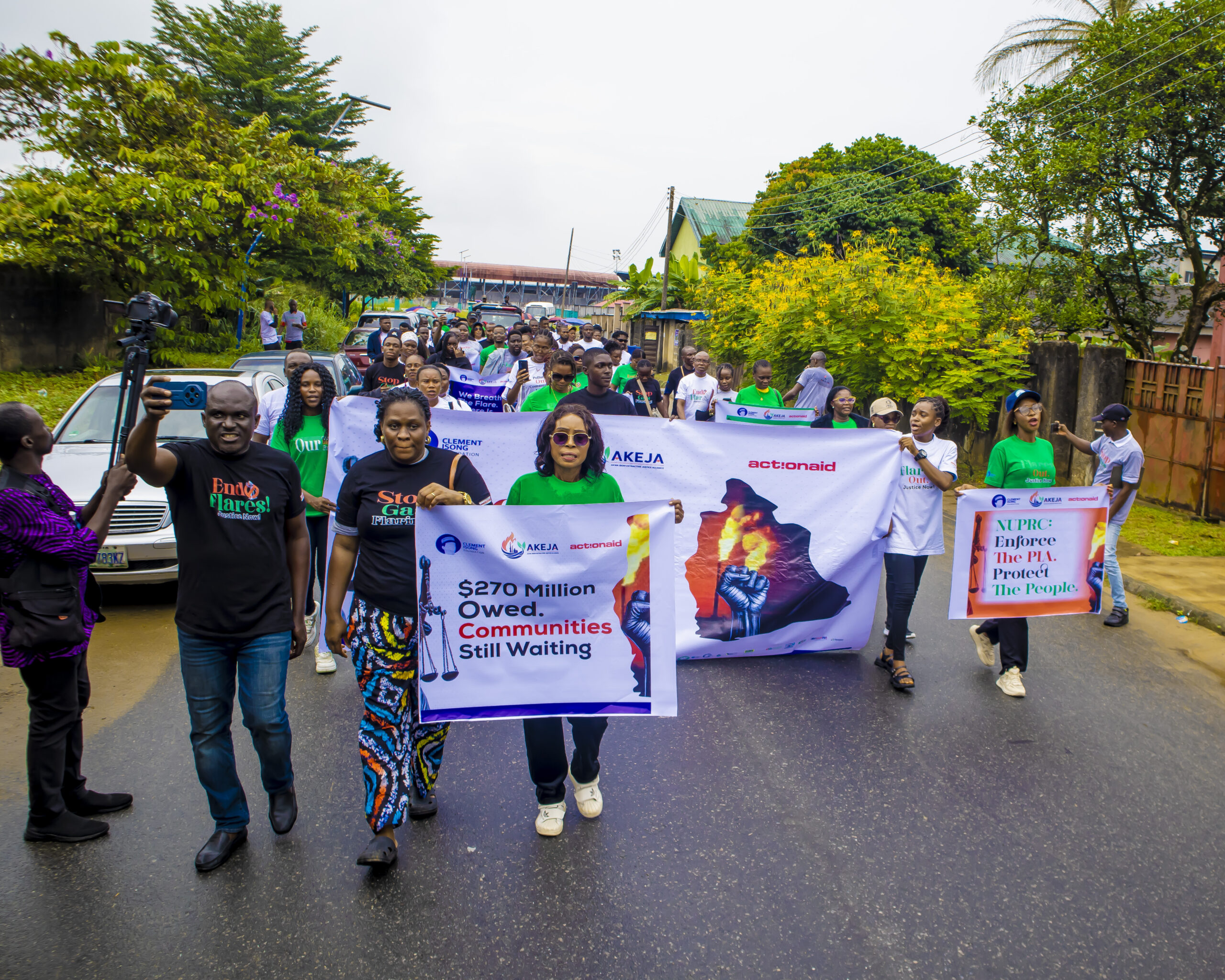 CSOs, communities protest at NUPRC office, demand accountability over $270 million gas flare penalties