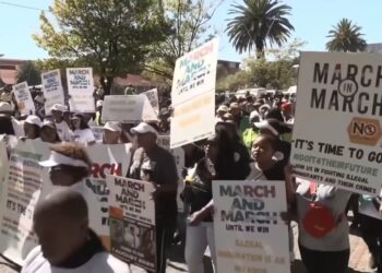 South African protesters (CREDIT: theconversation)